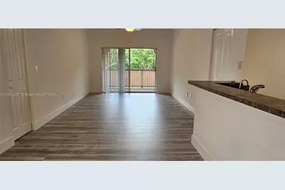 5860 W Sample Rd #201, Coral Springs, FL 33067 - Photo 1