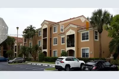8000 N Nob Hill Rd #101, Tamarac, FL 33321 - Photo 1