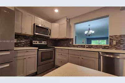 2003 Granada Dr #E4, Coconut Creek, FL 33066 - Photo 1