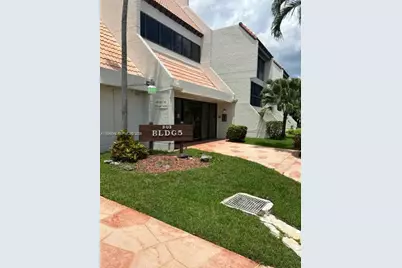 303 Racquet Club Rd #106, Weston, FL 33326 - Photo 1