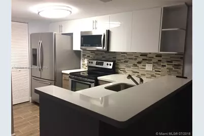 10749 Cleary Blvd #107, Plantation, FL 33324 - Photo 1