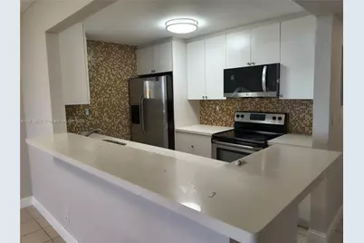 9143 SW 77th Ave #B702, Miami, FL 33156 - Photo 1