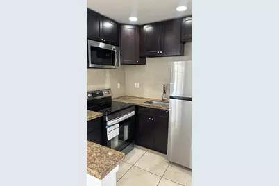 2121 NE 168th St #08, North Miami Beach, FL 33162 - Photo 1