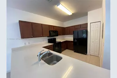 210 NW 109th Ave #204, Miami, FL 33172 - Photo 1