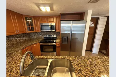 8301 SW 142nd Ave #C201, Miami, FL 33183 - Photo 1