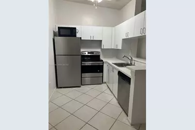 9729 SW Hammocks Blvd #201E, Miami, FL 33196 - Photo 1