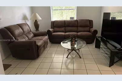 670 NW 114th Ave #204, Sweetwater, FL 33172 - Photo 1