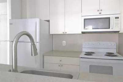 1225 NE 124th St #34B, North Miami, FL 33161 - Photo 1