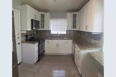 1450 NE 191st St #201, Miami, FL 33179 - Photo 1