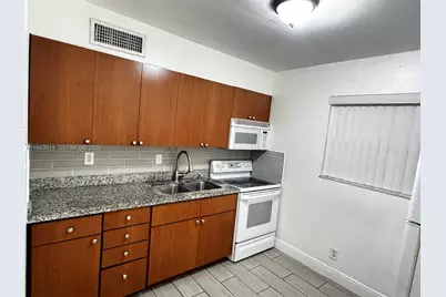 30 SE 4th Ave #110, Hallandale Beach, FL 33009 - Photo 1