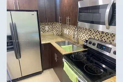 6950 Miami Gardens Dr #2-402A, Hialeah, FL 33015 - Photo 1