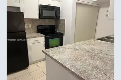 18338 NW 68th Ave #G, Hialeah, FL 33015 - Photo 1