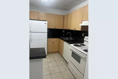 7110 NW 179th St #110, Hialeah, FL 33015 - Photo 1
