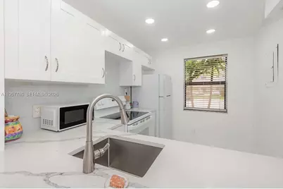 10434 Sunrise Lakes Blvd #109, Sunrise, FL 33322 - Photo 1