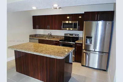4055 W McNab Rd #H311, Pompano Beach, FL 33069 - Photo 1