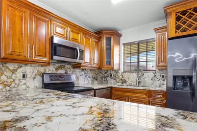 6765 NW 182nd St #104, Hialeah, FL 33015 - Photo 1