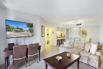 927 NE 199th St #104, Miami, FL 33179 - Photo 1