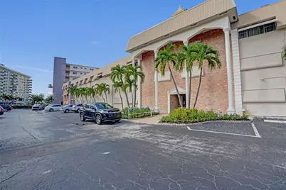 300 Golden Isles Dr #102, Hallandale Beach, FL 33009 - Photo 1
