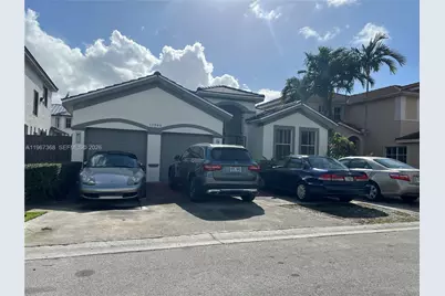 12960 NW 9 Ln #West, Miami, FL 33182 - Photo 1