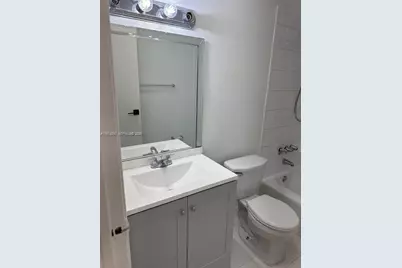 18051 NW 68th Ave #J104, Hialeah, FL 33015 - Photo 1