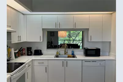 13105 SW 16th Ct #313L, Pembroke Pines, FL 33027 - Photo 1