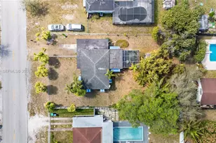 1055 NW 143rd St, Miami, FL 33168 - Photo 1