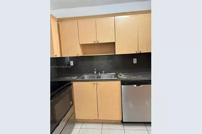 940 NE 170th St #120, North Miami Beach, FL 33162 - Photo 1