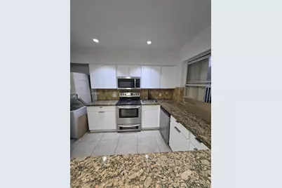 1701 N Treasure Dr #5, North Bay Village, FL 33141 - Photo 1