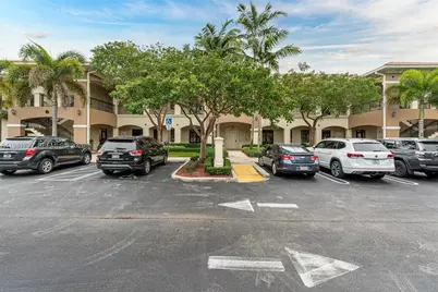7551 Wiles Rd #203, Coral Springs, FL 33067 - Photo 1