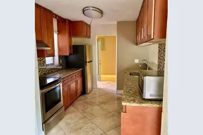 3100 N Pine Island Rd #103, Sunrise, FL 33351 - Photo 1
