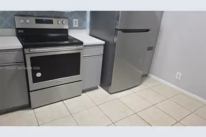 8901 Wiles Rd #303, Coral Springs, FL 33067 - Photo 1