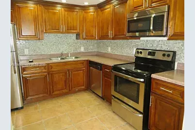 2025 NE 164th St #312, North Miami Beach, FL 33162 - Photo 1