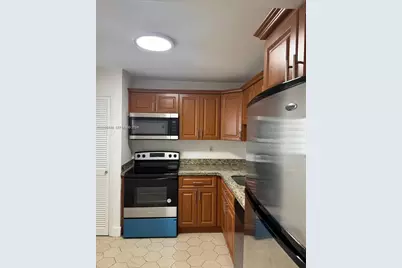 1401 NE 191st St #D108, Miami, FL 33179 - Photo 1