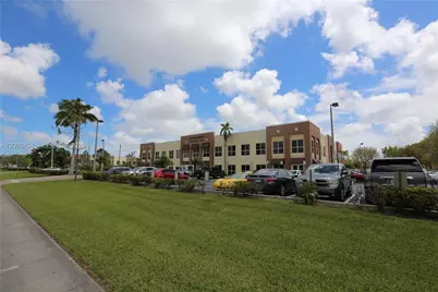 12002 SW 128th Ct #203, Miami, FL 33186 - Photo 1