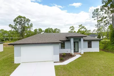 612 Ames St E, Lehigh Acres, FL 33974 - Photo 1