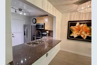 1351 NE 191st St #E119, Miami, FL 33179 - Photo 1