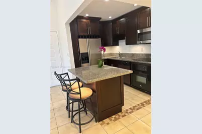 7160 NW 179th St #302, Hialeah, FL 33015 - Photo 1