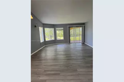 2301 NW 33rd St #107, Oakland Park, FL 33309 - Photo 1
