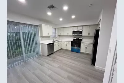 11461 NW 43rd St #A, Coral Springs, FL 33065 - Photo 1