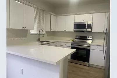 6960 NW 177th St #N103, Hialeah, FL 33015 - Photo 1