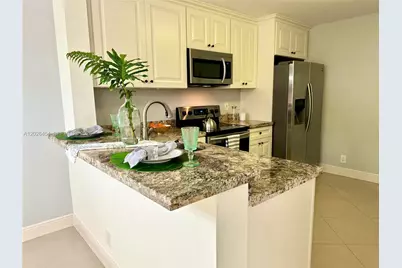 10141 W Sunrise Boulevard #203, Plantation, FL 33322 - Photo 1