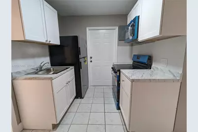 987 NE 131st #4, North Miami, FL 33161 - Photo 1