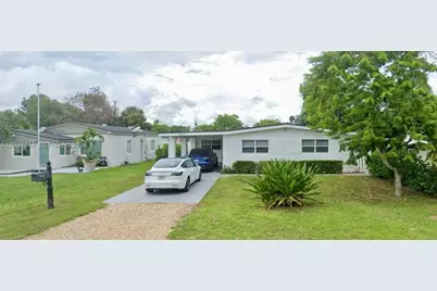 1869 NE 173rd St, North Miami Beach, FL 33162 - Photo 1