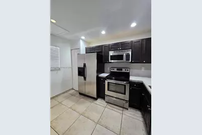 911 NE 209th Ter #204-27, Miami, FL 33179 - Photo 1