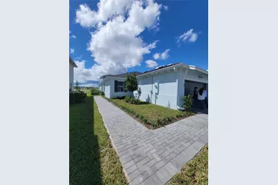1689 Whistlegrass Ln #1689, Loxahatchee, FL 33470 - Photo 1