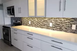 100 Golden Isles Dr, Hallandale Beach, FL 33009 - Photo 1