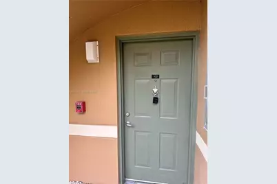 8050 N Nob Hill Rd #102, Tamarac, FL 33321 - Photo 1