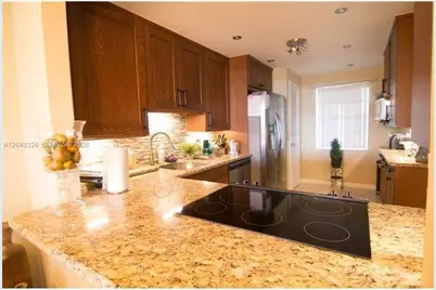 4030 W Palm Aire Dr #505, Pompano Beach, FL 33069 - Photo 1