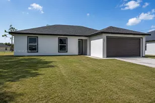 704 E Carbon, Lehigh Acres, FL 33974 - Photo 1