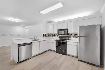 5661 Riverside Dr #103B7, Coral Springs, FL 33067 - Photo 1